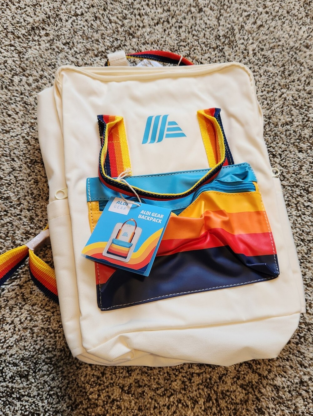 Aldi Gear Cream Backpack with Multi-Color Stripe Pocket